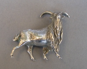 a collection of silver animals