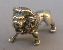 a collection of silver animals