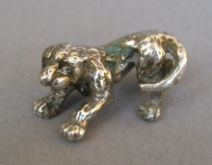 a collection of silver animals
