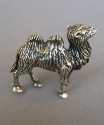 a collection of silver animals