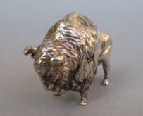 a collection of silver animals