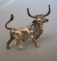 a collection of silver animals