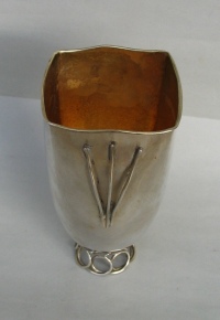 silver vase with intertwined wirework