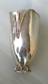silver vase with intertwined wirework