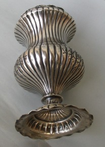 silver vase with floral engraving