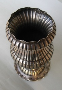 silver vase with floral engraving