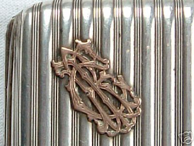 silver 800/1000
German
cigarette case:
golden monogram silver 900/1000
German
cigarette case;
golden monogram