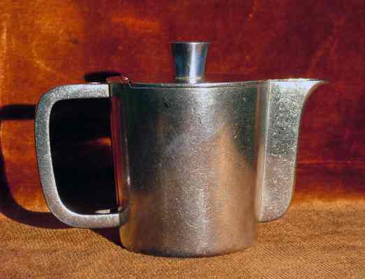 A silver-plated coffee-pot with the logo 'Jolly Hotels Ciatsa', issued by Milan BMF branch after 1955. Designed by Gio Ponti A silver-plated coffee-pot with the logo 'Jolly Hotels Ciatsa', issued by Milan BMF branch after 1955. Designed by Gio Ponti